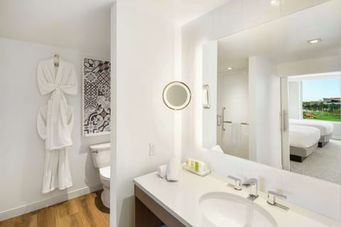 Suite, 2 Queen Beds | Bathroom | Rainfall showerhead, designer toiletries, hair dryer, towels