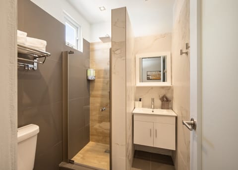 City Room | Bathroom | Shower, rainfall showerhead, hair dryer, towels