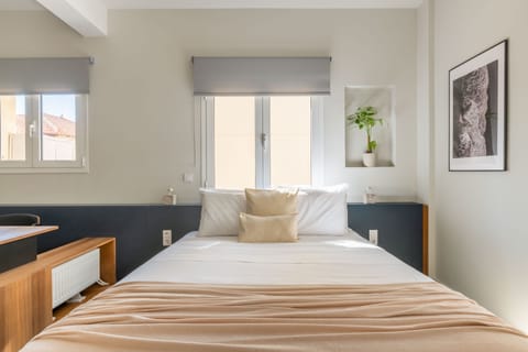 Standard Apartment | Individually decorated, blackout drapes, iron/ironing board, free WiFi