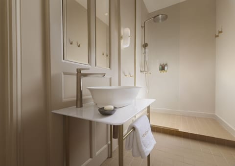 Echo Suite with Balcony | Bathroom | Shower, designer toiletries, hair dryer, bathrobes