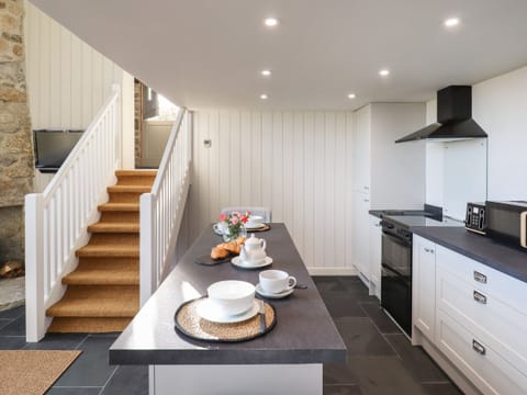 Fridge, electric kettle, toaster, cookware/dishes/utensils