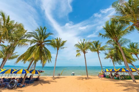 On the beach, beach shuttle, sun loungers, beach umbrellas