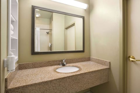 Bathtub, hair dryer, towels