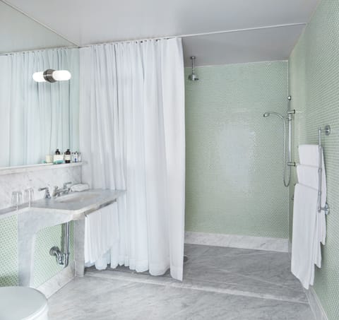 Junior Penthouse | Bathroom | Designer toiletries, hair dryer, towels