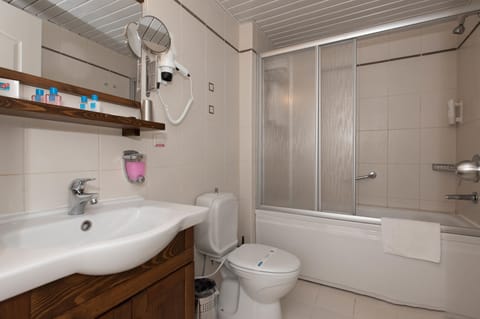 Superior Room | Bathroom | Hair dryer, towels, soap, shampoo