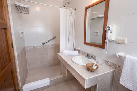 Family Triple Room, Mountain View | Bathroom | Shower, rainfall showerhead, eco-friendly toiletries, hair dryer