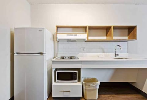 Premium bedding, desk, blackout drapes, iron/ironing board