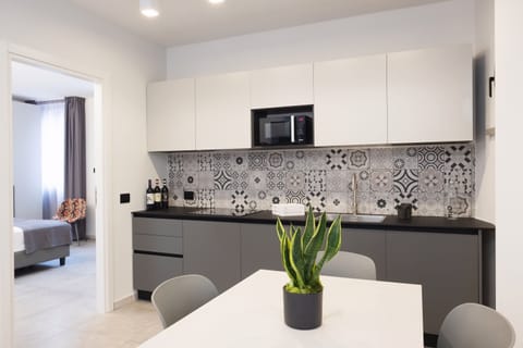 Junior Suite, 1 Bedroom, Kitchenette | Private kitchen | Fridge, microwave, stovetop, dishwasher