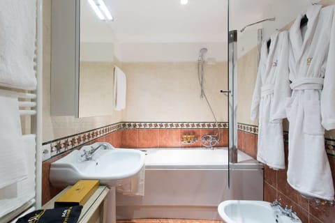 Shower, free toiletries, hair dryer, slippers