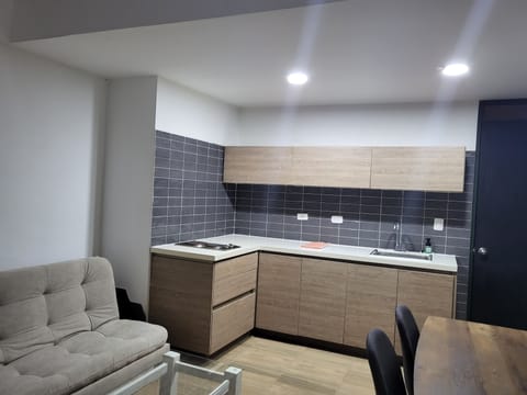 Basic Duplex, 1 Queen Bed with Sofa bed (#1 Tranquilo) | Private kitchen | Full-size fridge, coffee/tea maker, blender, griddle