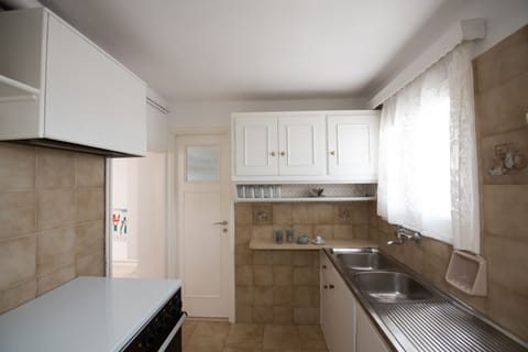 Family Apartment, 2 Bedrooms, Sea View | Private kitchen | Mini-fridge, espresso maker, coffee/tea maker, electric kettle