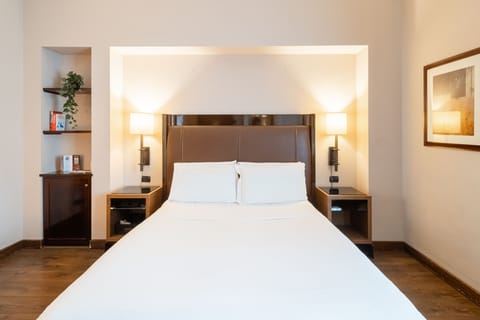 Suite | In-room safe, desk, laptop workspace, blackout drapes