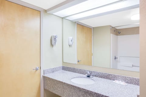 Combined shower/tub, hair dryer, towels, toilet paper