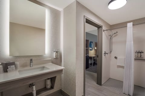 Suite, 1 King Bed, Accessible (Mobility, Roll-In Shower) | Bathroom | Shower, hydromassage showerhead, hair dryer, towels