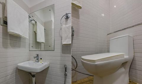 Deluxe Room | Bathroom | Shower, rainfall showerhead, free toiletries, towels