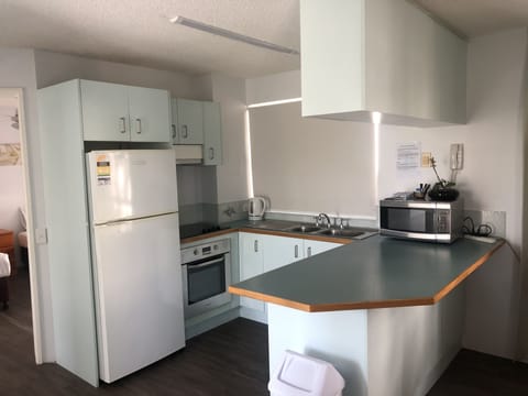 Family Apartment, 2 Bedrooms, Garden View | Private kitchen | Fridge, microwave, oven, stovetop