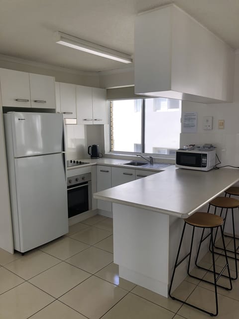 Family Apartment, 2 Bedrooms, Partial Ocean View | Private kitchen | Fridge, microwave, oven, stovetop