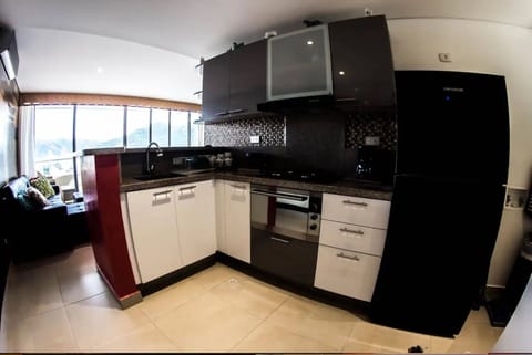 Comfort Apartment | Private kitchen | Full-size fridge, microwave, oven, stovetop