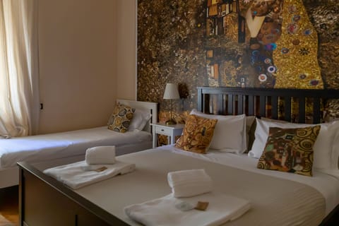 Classic Triple Room - Outdoor bathroom shared with one room | Blackout drapes, free WiFi, bed sheets