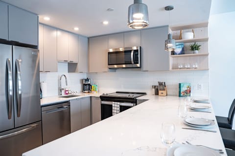 Condo | Private kitchen | Full-size fridge, microwave, oven, dishwasher