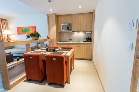 Suite, 1 Bedroom, City View | Private kitchenette | Fridge, microwave, stovetop, dishwasher