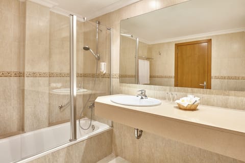 Bathtub, deep soaking tub, eco-friendly toiletries, hair dryer