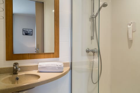 Shower, free toiletries, towels, soap