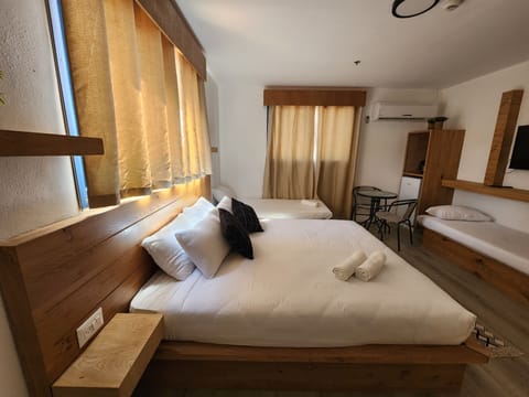 Deluxe Double Room, Refrigerator, Lake View | Minibar, in-room safe, individually furnished, desk