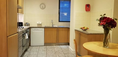 Comfort Apartment | Private kitchen | Full-size fridge, microwave, oven, stovetop