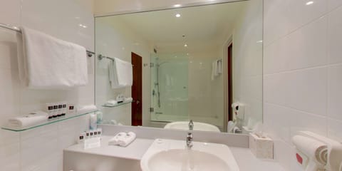 Standard Family Room | Bathroom | Shower, free toiletries, hair dryer, towels