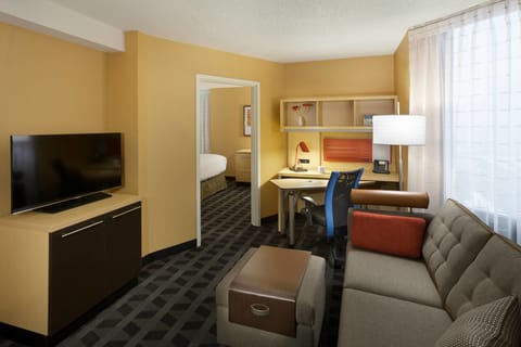 Suite, 1 Bedroom | Desk, laptop workspace, blackout drapes, iron/ironing board