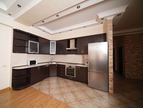 Family Condo, 2 Bedrooms, 2 Bathrooms, City View | Private kitchen | Fridge, microwave, oven, stovetop