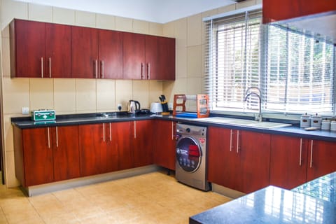 Exclusive Apartment | Private kitchen | Full-size fridge, microwave, stovetop, dishwasher