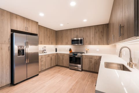 Caltrain-Facing, Two-Bedroom Apartment | Private kitchen | Full-size fridge, microwave, oven, stovetop