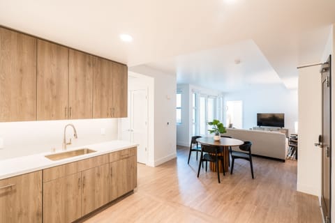 Caltrain-Facing, Two-Bedroom Apartment | Living area | 55-inch Smart TV with digital channels, TV