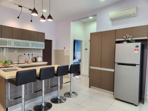 Family Apartment | Private kitchen | Full-size fridge, electric kettle, rice cooker, cookware/dishes/utensils