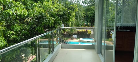 Luxury Room, 1 King Bed, Balcony, Pool View | Terrace/patio