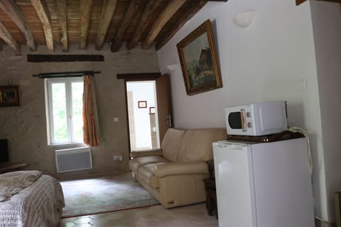 Comfort House, Garden View | Living area | Flat-screen TV