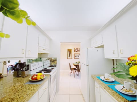 Superior 1-Bedroom King  w/ Kitchen & Sofa Bed | Private kitchen | Full-size fridge, microwave, oven, coffee/tea maker