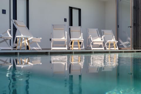 Indoor pool, seasonal outdoor pool, sun loungers