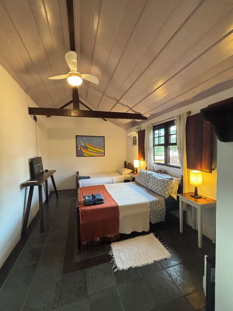 Classic Triple Room, Multiple Beds | Minibar, free WiFi, bed sheets