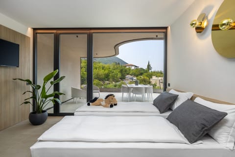 Family Suite, Terrace, Lake View | Minibar, in-room safe, desk, laptop workspace