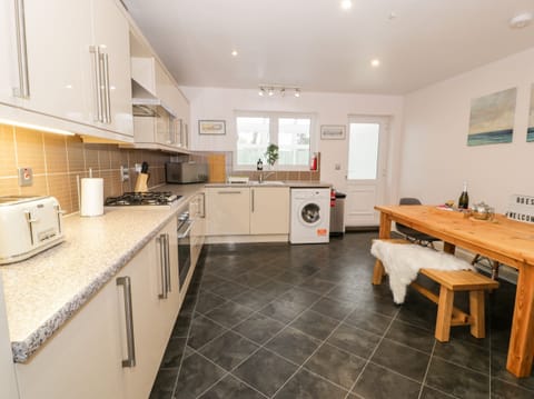 Fridge, electric kettle, toaster, cookware/dishes/utensils