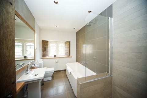 Luxury Double or Twin Room | Bathroom | Combined shower/tub, hair dryer, bathrobes, slippers