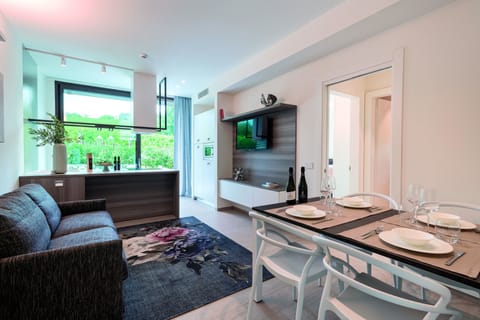 Luxury Condo | Living area | 48-inch flat-screen TV with satellite channels, TV