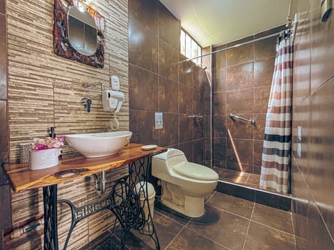 Standard Double Room | Bathroom | Shower, hair dryer, towels, soap