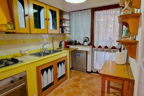 Villa | Private kitchen | Fridge, microwave, oven, stovetop