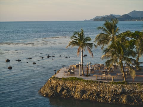 Breakfast, lunch, dinner served; beach views