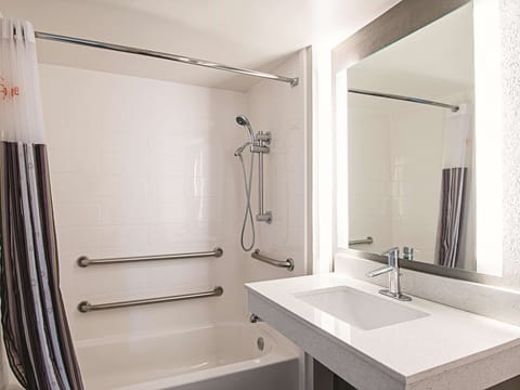 Combined shower/tub, eco-friendly toiletries, hair dryer, towels