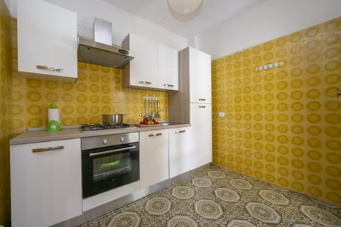 Family Apartment, 1 Bedroom (Baia Degli Dei Bilo Close To Taormina) | Private kitchen | Fridge, oven, stovetop, cookware/dishes/utensils